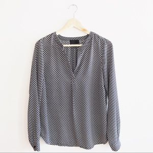 Flowy houndstooth split neck blouse